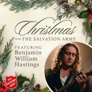 Christmas album cover with festive decorations, featuring Benjamin William Hastings playing guitar.