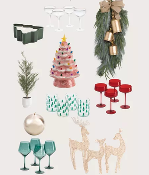 Assorted Christmas decor items including glasses, ornaments, wreath, ceramic tree, and reindeer figures.