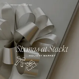 Silver gift bow on a gray background with the text 'Sixmas at Stackt Holiday Market' and gift icons.